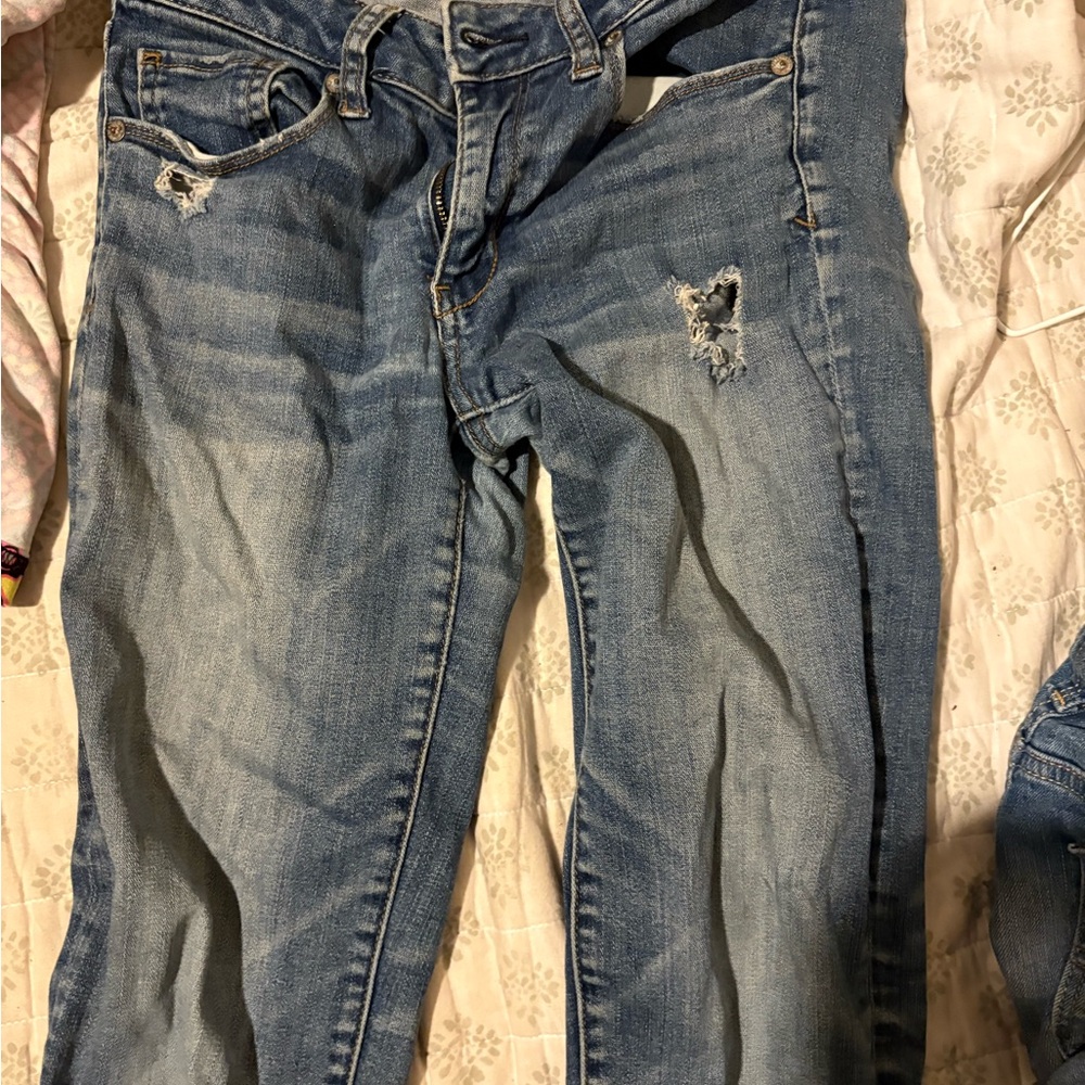 Distressed Blue Jeans